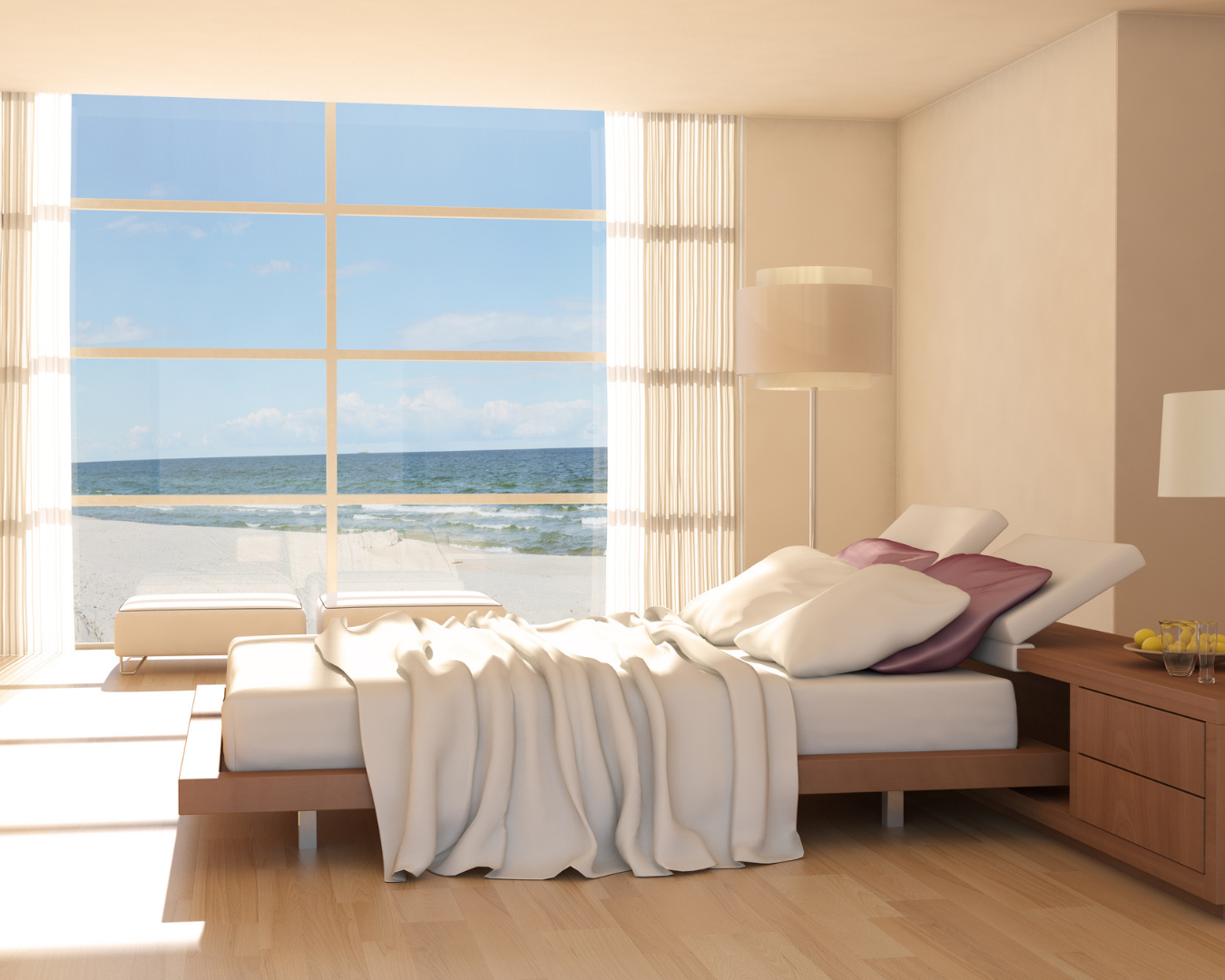 Wide shot of sleek, minimalistic bedroom in beach house with large windows.