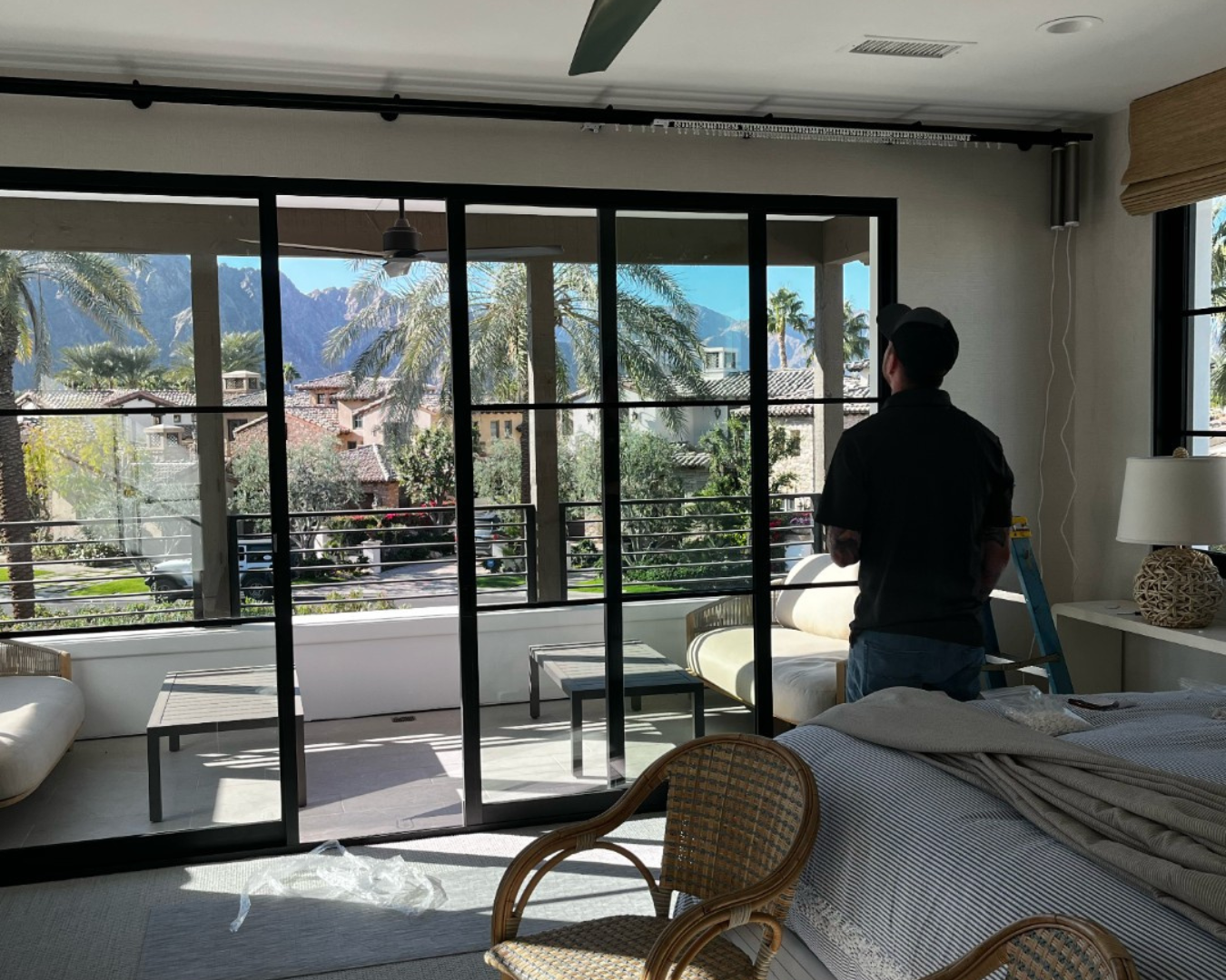 Nick from Vesta making sure drapery hardware is properly installed in California home.